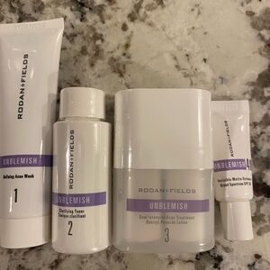 Rodan + Fields UNBLEMISH Acne Treatment Set - White and Purple